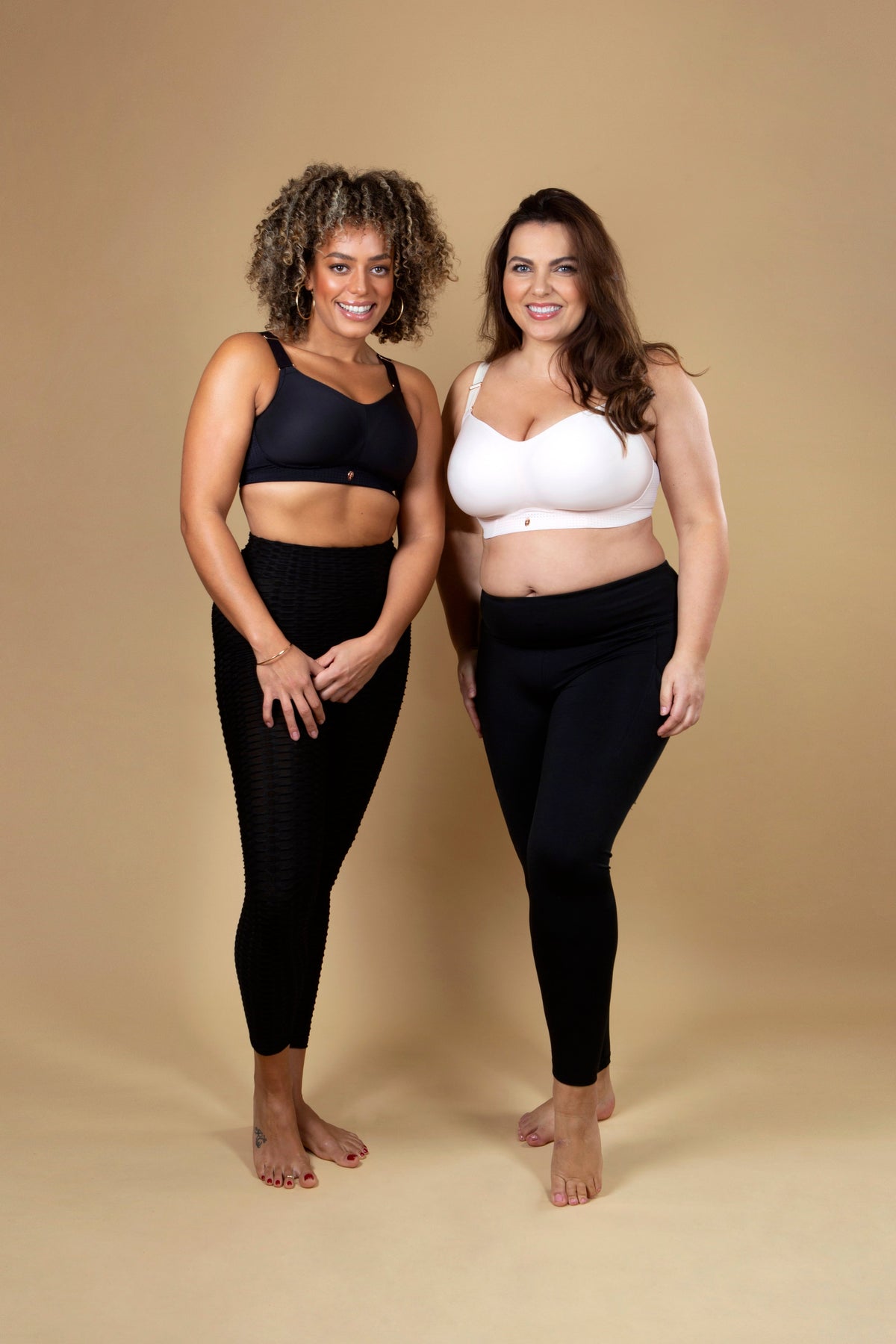 Black full-cup high-impact sport bra with wide straps and smooth molded cups