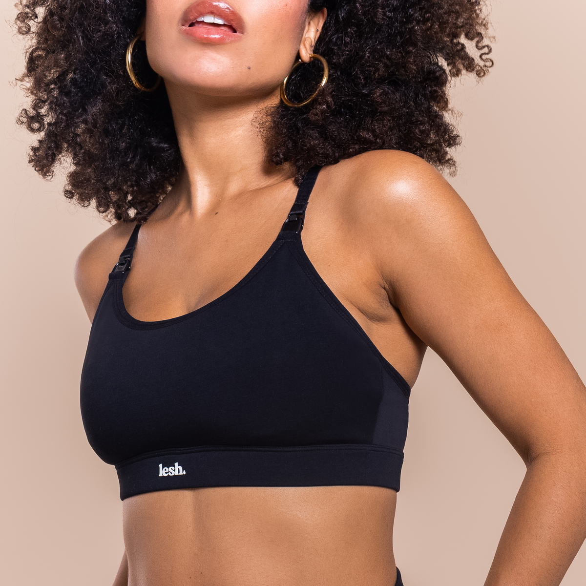 Navy leakproof nursing bra with adjustable shoulder straps and racerback support