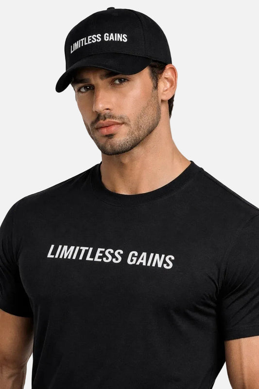 Black baseball cap with embroidered 'LIMITLESS GAINS' on the front panel