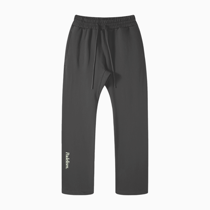 Dark gray straight-leg pants with elastic waistband, side tie, and Padelism logo