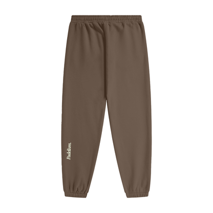 Dark brown heavyweight fleece joggers with elastic waist and drawstring; Padelism logo
