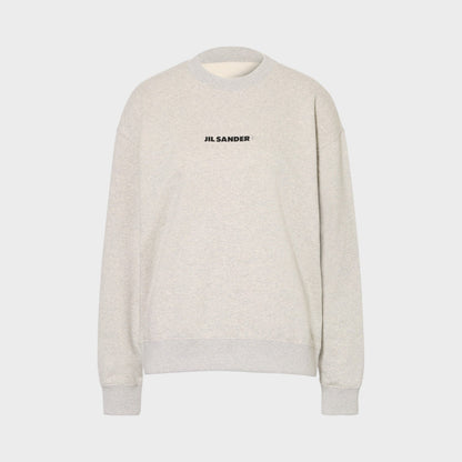 Light grey crewneck sweatshirt with chest logo, long sleeves and ribbed cuffs