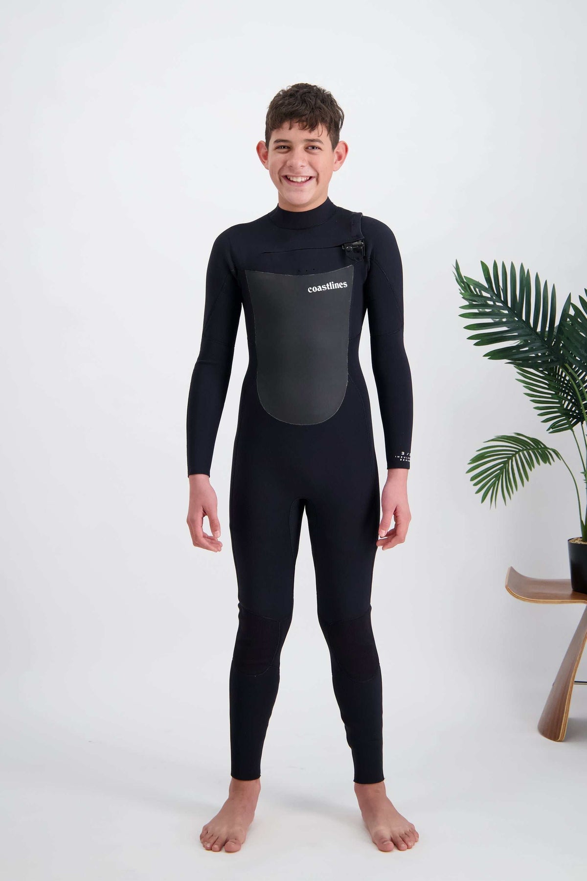 Youth 4/3 chest-zip steamer wetsuit, black with gray chest panel, long sleeves and legs