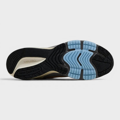 Outsole with black tread and light blue flex grooves