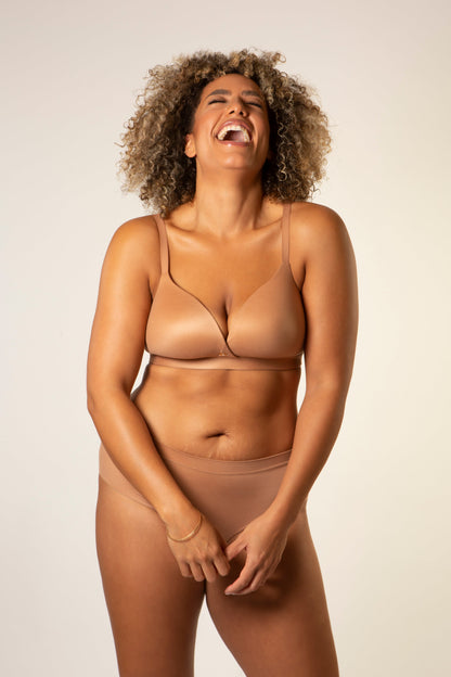 Warm tan V-neck bra with thin straps and smooth lower band