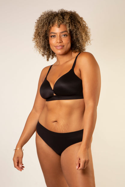 Black bra with thin straps and smooth molded cups