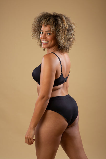 Black mid-rise briefs shown from the side with smooth waistband