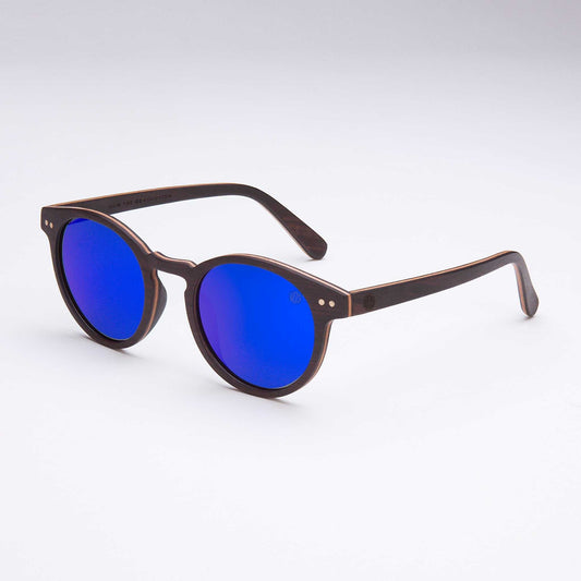 Brown sunglasses with sapphire blue mirrored round lenses, angled frames