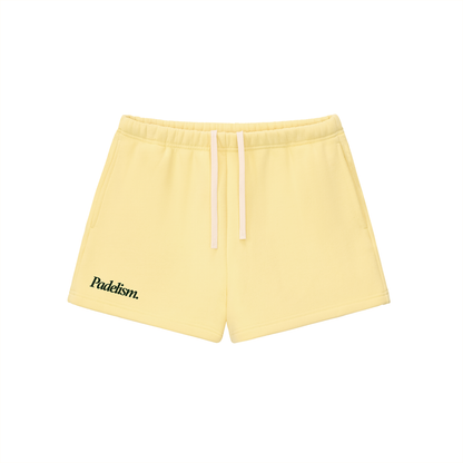 Yellow core shorts with elastic waistband and drawstring, side logo
