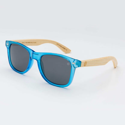 Blue sunglasses with dark gray lenses and light wood arms, square frames