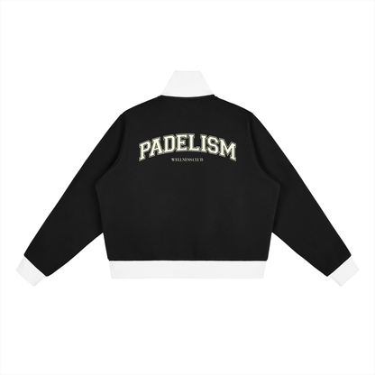 Black track jacket with white side stripes, back PADELISM graphic, stand collar, zip front.