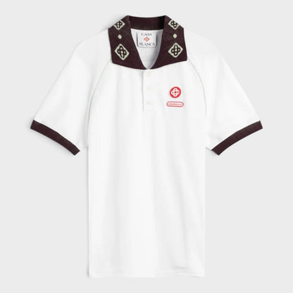 White textured piqué polo shirt with dark chenille collar and sleeve cuffs