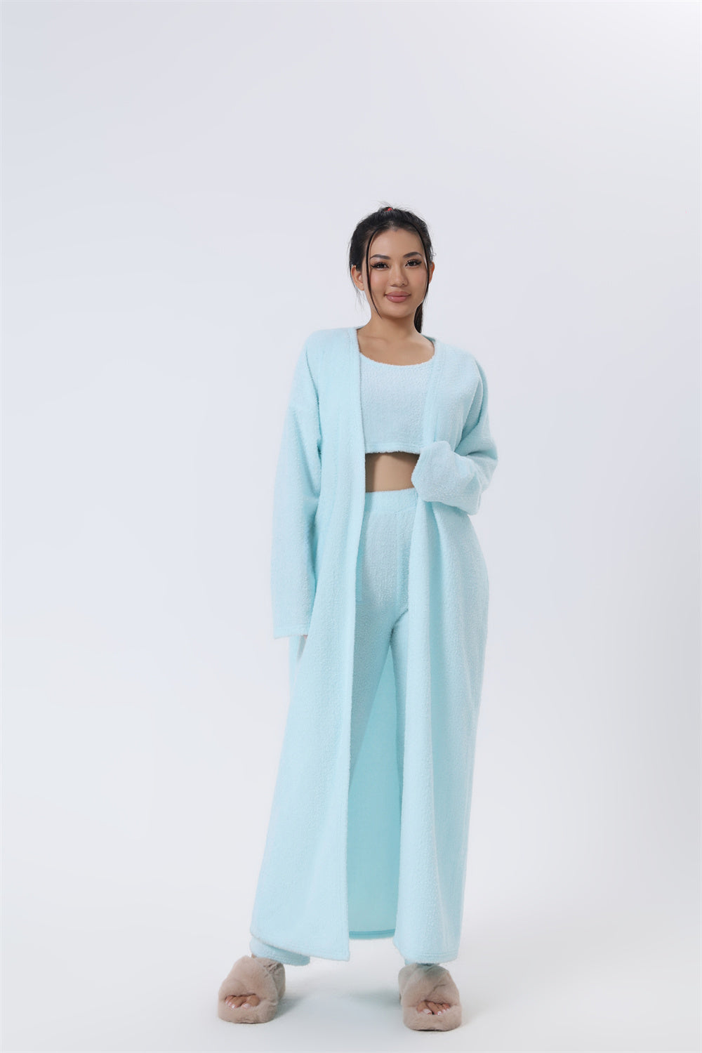 Light blue lounge set with crop tank, matching pants, and open long cardigan robe