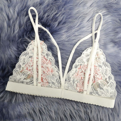 Embroidered white bralette with red rose appliques, lace cups, and thin straps