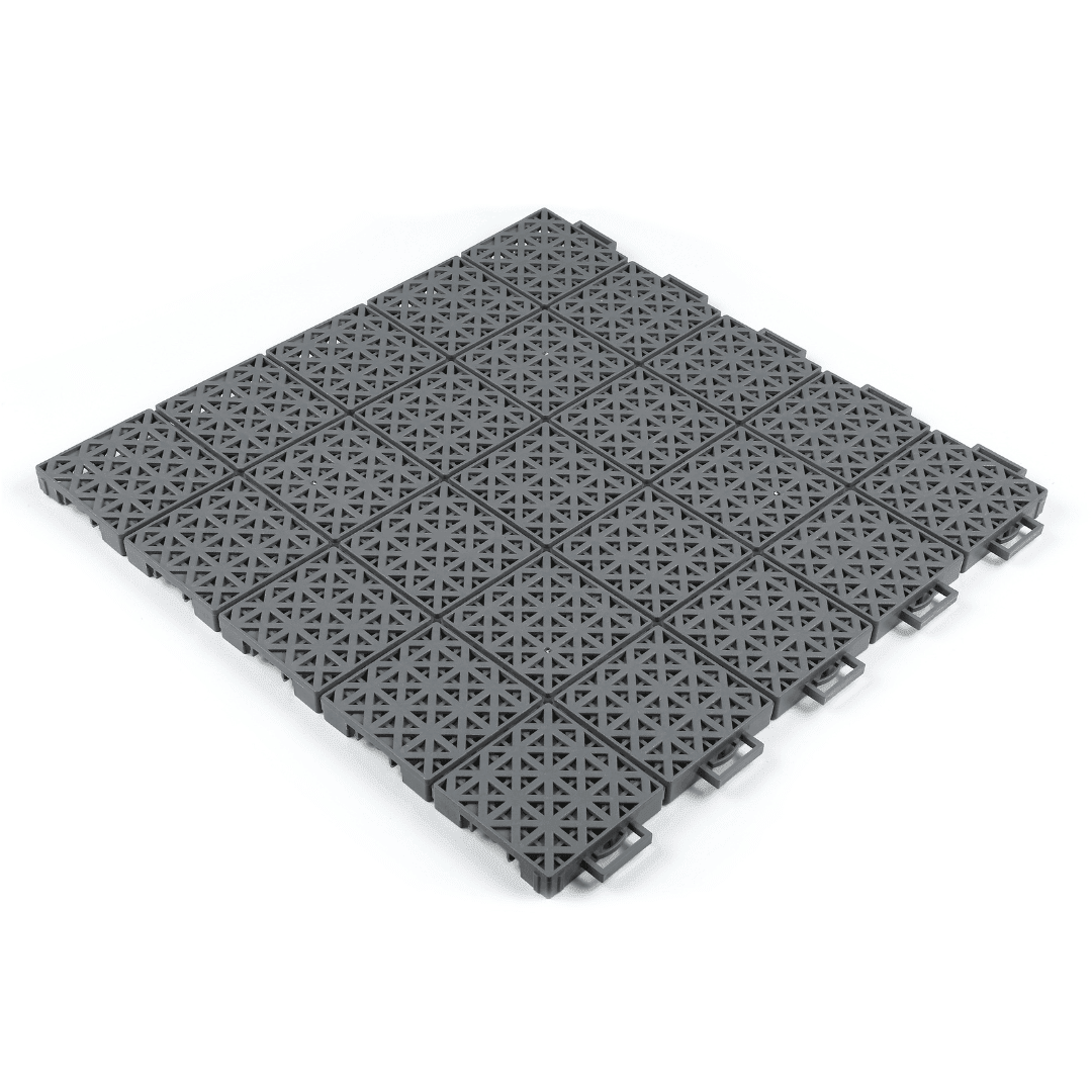 Outdoor pickleball court tile panels in dark gray with interlocking base clips