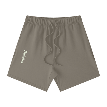 Gray off-court shorts with elastic waistband, drawstring detail, and side logo