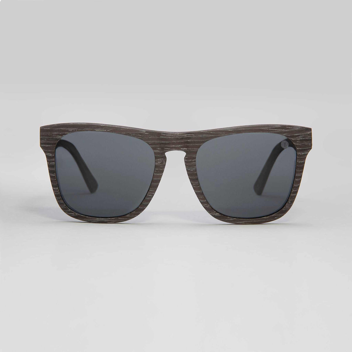 Polarised sunglasses with dark lenses and brown woodgrain-style frame