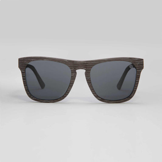 Polarised sunglasses with dark lenses and brown woodgrain-style frame