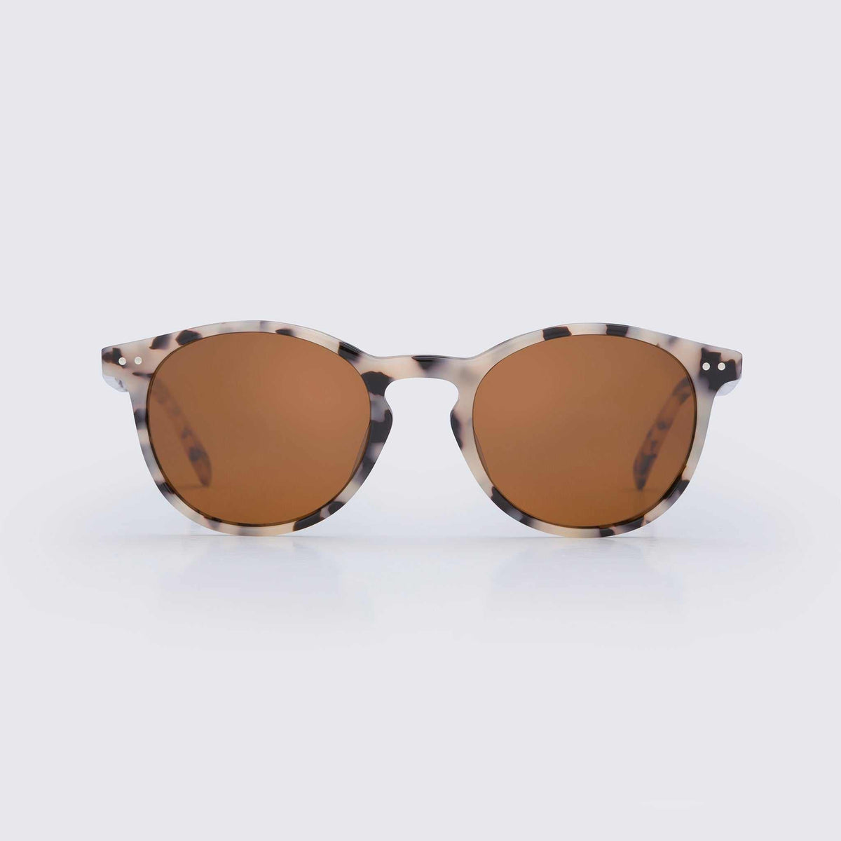 Leopard-print sunglasses with round frames and brown tinted lenses