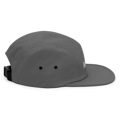 Grey five-panel cap with curved brim; ventilation eyelets visible