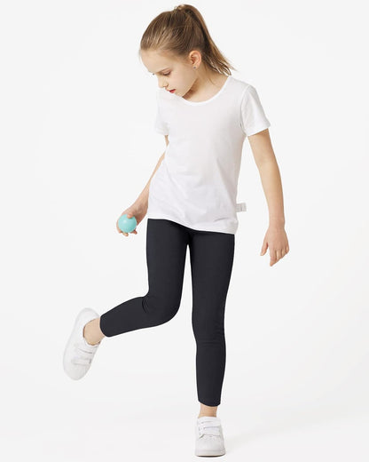 Girls black cotton leggings in motion, full length with elastic waistband