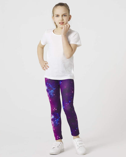 Girls' purple galaxy leggings with a white top; starry print and white sneakers