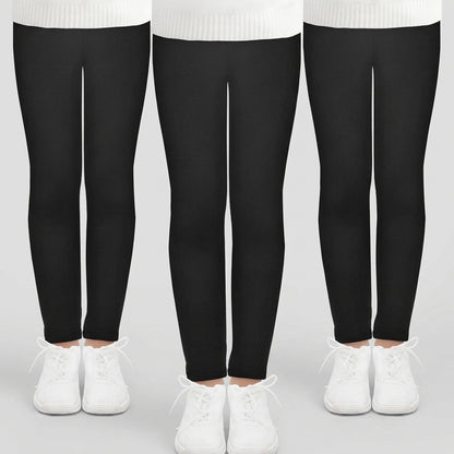 Three views of a person wearing black leggings with white sneakers, cropped from the waist down on a plain white background.