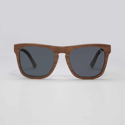 Toffee-brown sunglasses with dark gray lenses and thick cat-eye frame