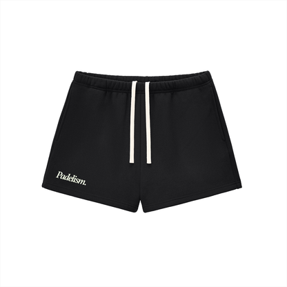 Black core shorts with elastic waistband and drawstring, side logo