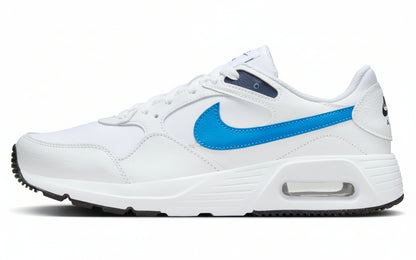 White sneaker with blue swoosh logo on a white background