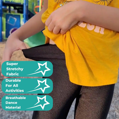 Girls' black shiny stretch leggings, durable non-transparent fabric close-up