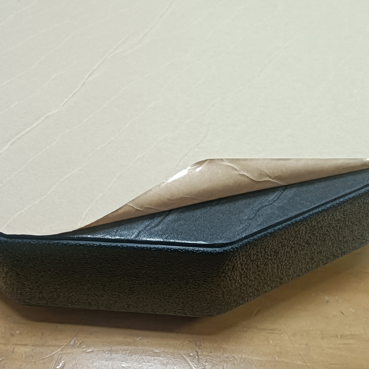 PU leather cushion detail on smart music boxing machine with blue trim edge