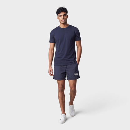 Navy drawstring shorts with embroidered logo and multicolor side stripe accents