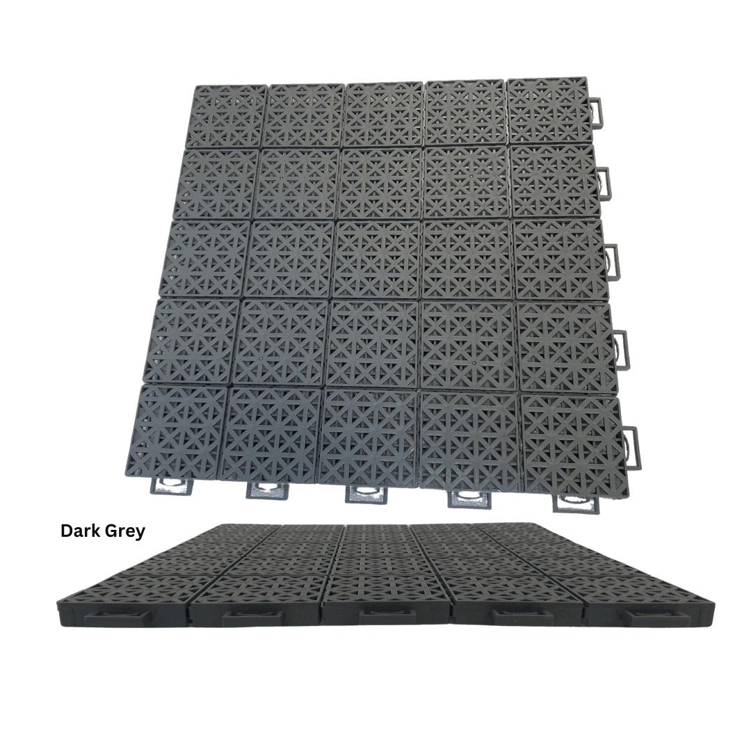 Modular pickleball court tiles in dark gray, textured grid surface with snap-lock borders