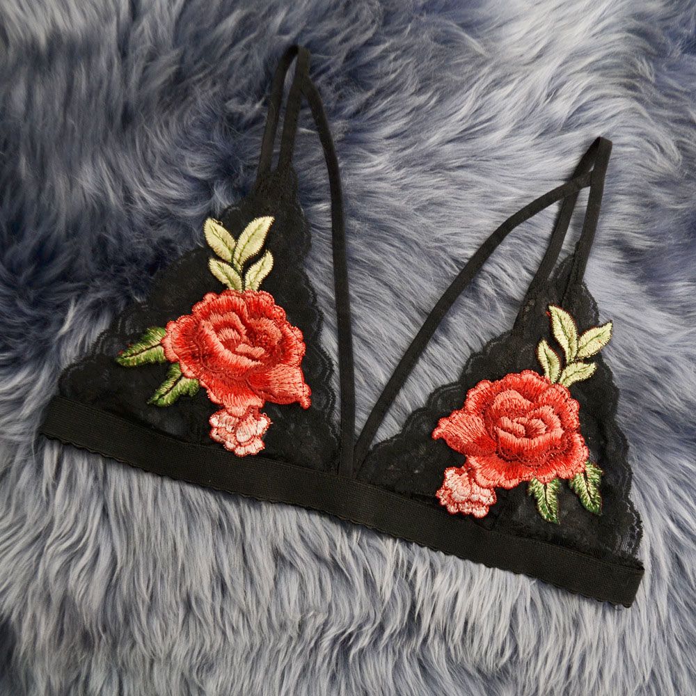 Embroidered black bralette with red rose appliques, lace cups, and thin straps