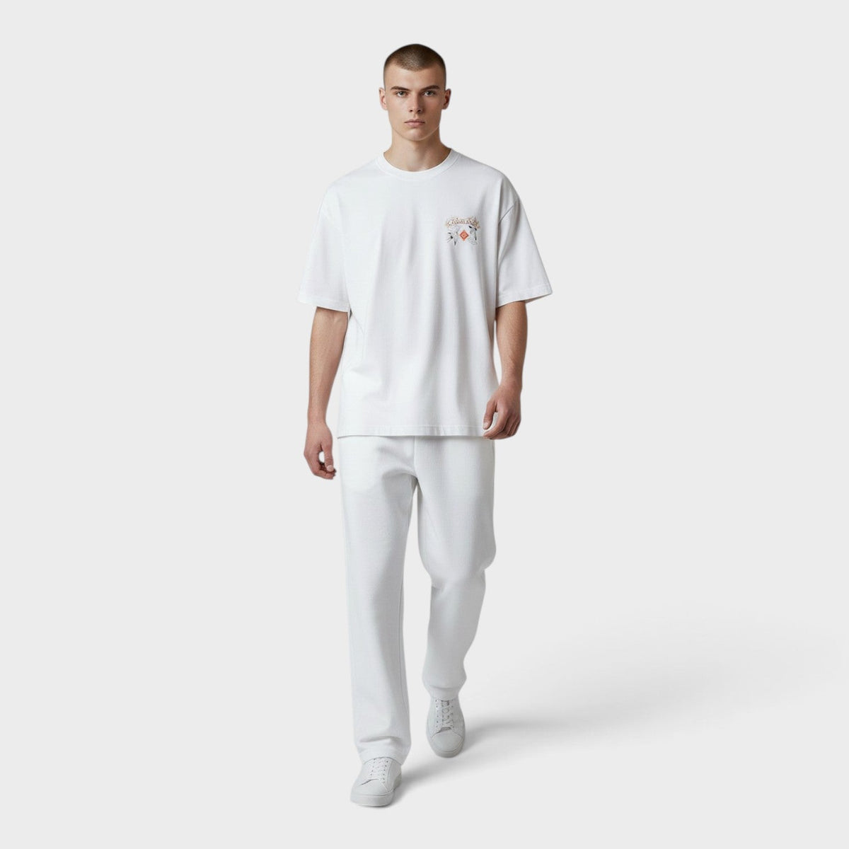 White T-shirt with small tennis club logo on chest, crew neck short sleeves