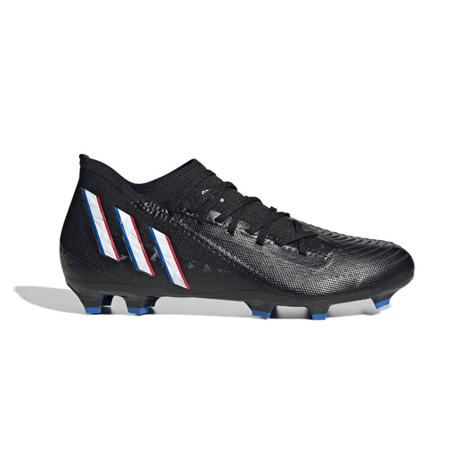 Black football boot with blue/red side stripes, textured upper, firm-ground studs
