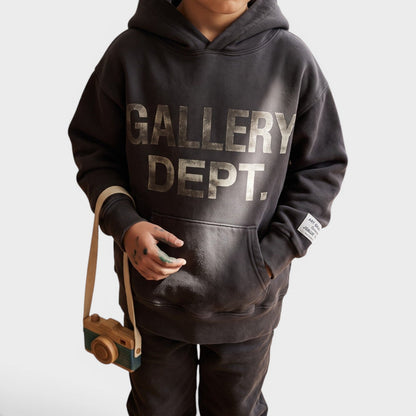 Kids black pullover hoodie worn, large front logo and kangaroo pocket