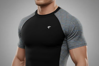 Black athletic shirt with plaid sleeves on a gray background