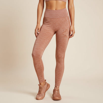 Folded brown fabric on a checkered surface