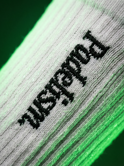 White crew sock with black Padelism logo on ribbed knit