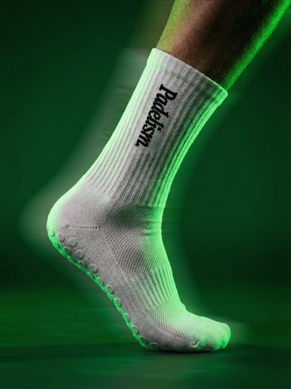 White crew socks with Padelism logo and dotted non-slip outsole