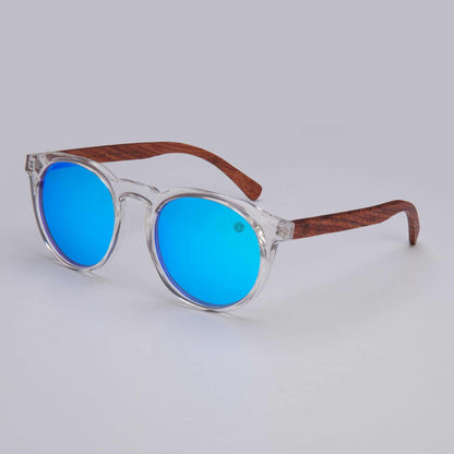 Round sunglasses with clear frame, blue tinted lenses, and brown wooden-style arms