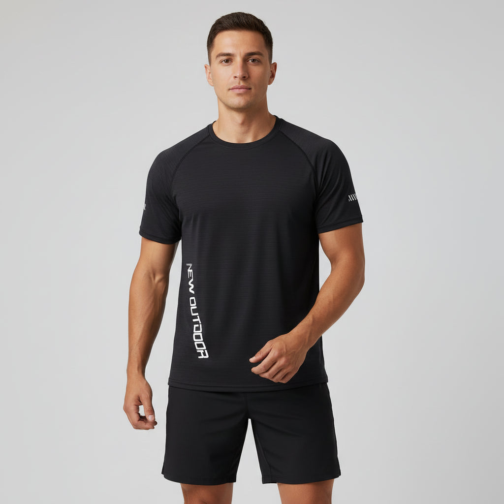 Man wearing a black athletic outfit with 'New Outdoor' branding on a gray background