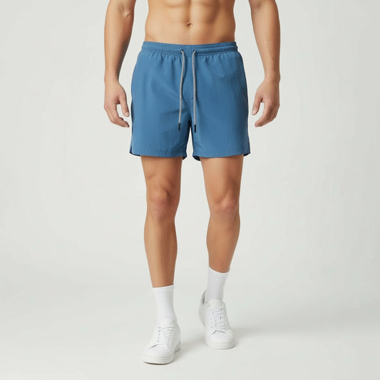 Blue shorts with a drawstring on a white background