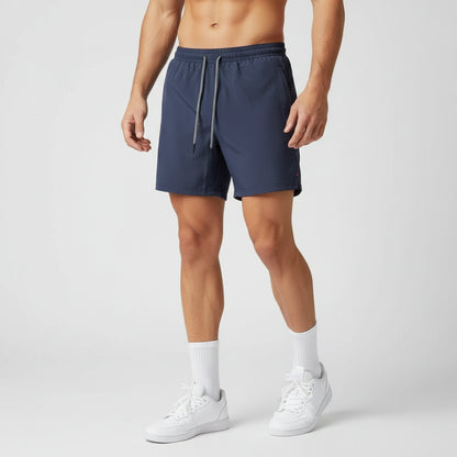 Navy blue shorts with a drawstring on a white background