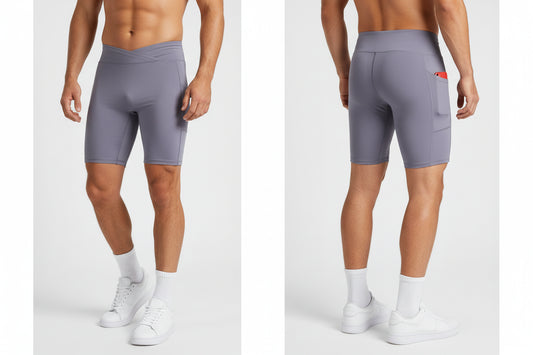 Gray athletic shorts with red pocket accents on a white background