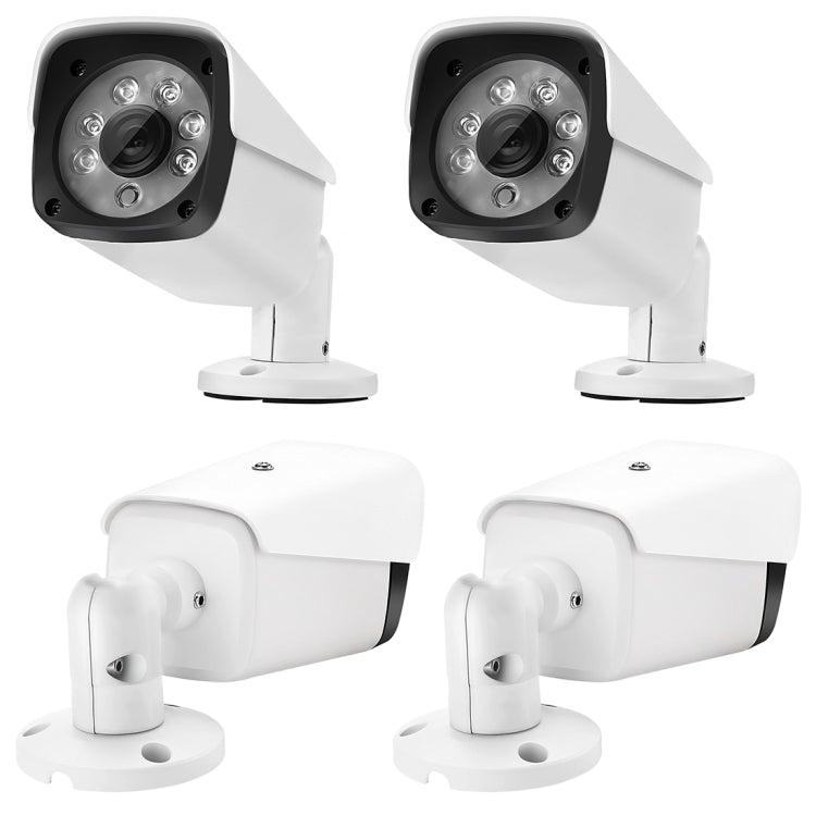 Four white CCTV cameras with protective housings and mounting bases
