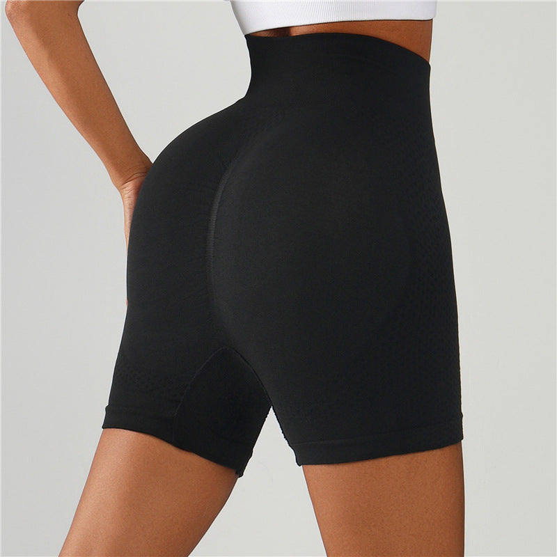 Black high-waisted gym shorts with smooth fabric, rear view