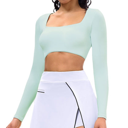 Women’s long-sleeve sports crop top and tennis skirt set, light blue top with white skirt
